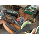 A quantity of tools - hammers, chisels, saws, drills, planes, spanners, sharpening stones,