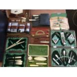 Seven cased sets of implements - sewing, manicure, geometry drawing, gents, etc., mainly incomplete.