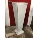 A painted square tapering jardiniere stand on stepped plinth base. (41.75in)
