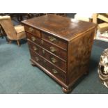 A seventeenth century William & Mary oyster laburnum & walnut chest, the moulded crossbanded top