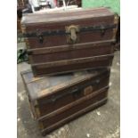 A domed top seamans chest with hardwood slats; and another similar smaller. (30in & 27in) (2)