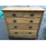A late Victorian satin walnut chest of drawers, with rectangular moulded top above two short and