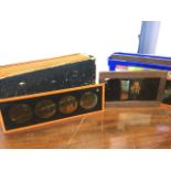 Seven 7in mahogany framed magic lantern glass slides with moving parts; and a box of twelve 9.5in