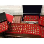 A collection of coins, mainly European, contained in trays, an aluminium case and folders, etc. (