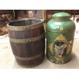 A Victorian numbered tin tea jar with domed lid; and a brass bound oak barrel with swing handle. (