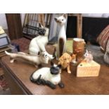 Two Beswick Siamese cats; a Sylvac spaniel; a Hornsea log vase; and four other animal figurines. (