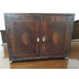 A late eighteenth century crossbanded mahogany spice cabinet, inlaid with fine boxwood & ebony