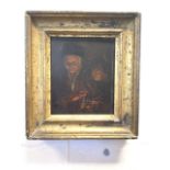 Nineteenth century oil on oak panel, dark candlelit scene with two figures, in gilt frame. (7in x
