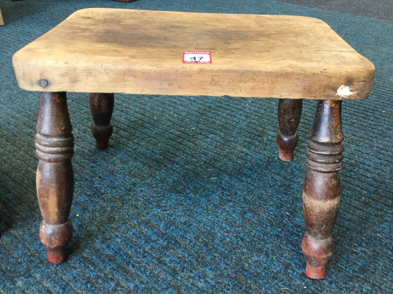 A near pair of upholstered footstools with turned gallery spindles in reeded rails, supported on - Image 3 of 3