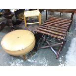 A folding luggage stool with slats to top; a 60s Sherborne circular upholstered stool on four teak