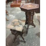 An hexagonal eastern carved coffee table, the tray top with central inlaid mother-of-pearl star