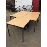 A set of five square modern tables, with faux beech formica style tops on square column legs. (29.