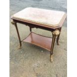 A French centre table with rectangular canted rouge marble slab in brass frame and moulded top,
