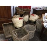 A large quantity of cane baskets - shopping, hampers, log baskets, wastepaper baskets, trays, flower