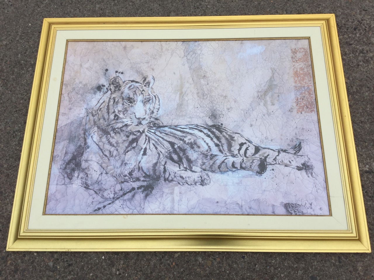 A large contemporary lithographic print of a tiger on crackle glaze ground, mounted & gilt