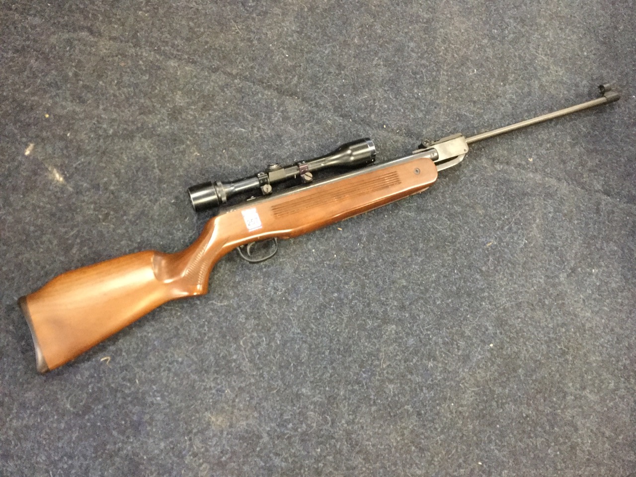 An Edgar Brothers .22 air rifle, model MOD.60, with hardwood stock, mounted with telescopic