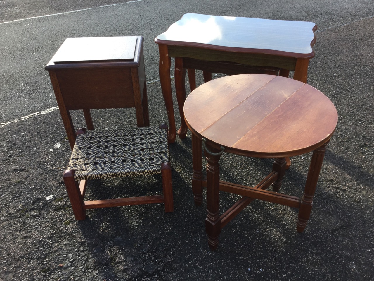 An oak box stool with hinged lid; a circular coffee table on square fluted legs joined by cross