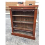 A Victorian mahogany open bookcase, with rectangular plain top above a frieze mounted with gilt