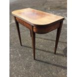 A nineteenth century mahogany turn-over-top tea table, the rounded leaves with ribbed edge above a