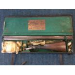 A cased Hardy Bros 12bore side-by-side hammer shotgun with 30in steel barrels, walnut stock and