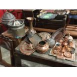 A collection of miscellaneous copper including hand-beaten, some art nouveau, embossed - trays,