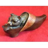 A cold painted bronze table vesta, cast as an oriental style shoe with kitten to lid, the interior
