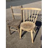 An elm seated chair with bar back on turned legs & stretchers; and an Ibex type chair with