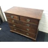 A Georgian mahogany chest of drawers, the crossbanded top above two short and three long