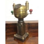 A Sestrel brass ships binnacle by Henry Browne & Son, mounted on square column stand, the domed