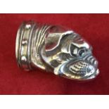 A Sterling silver vesta modelled as a bulldog, the head with studded collar inlaid with glass
