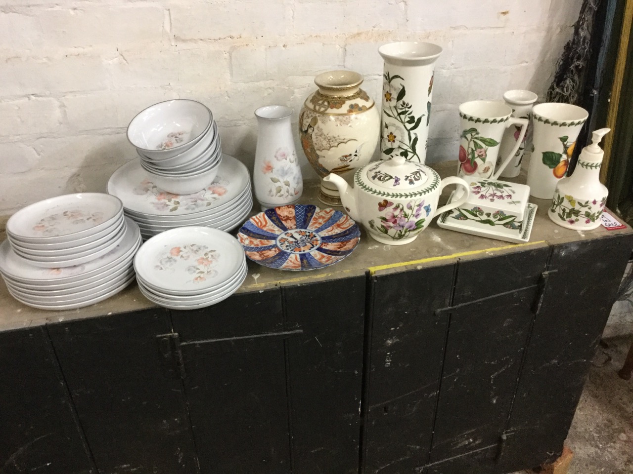 A Denby stoneware floral dinner/breakfast set; seven pieces of botanical Portmeirion pottery; a