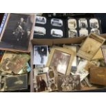 A family collection of old photographs, postcards and ephemera including old cheques, an autograph
