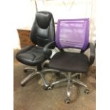 A faux leather upholstered office chair, the stitched panelled back & seat with three levers