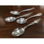 Four American silver spoons by Loch, Hardy & Hayes, and Sheafer & Lloyd, having foliate scrolled and