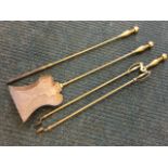 A set of art nouveau style bass fire irons with baluster turned handles - poker, tongs & shovel. (