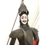 A European carved wood marionette, the moustachioed soldier with painted face fitted with embossed