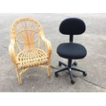 A bound bamboo cane armchair with fan shaped back and rounded arms; and a modern adjustable