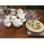 A set of six cut glass finger bowls with oval facets and star bases; and miscellaneous floral tea