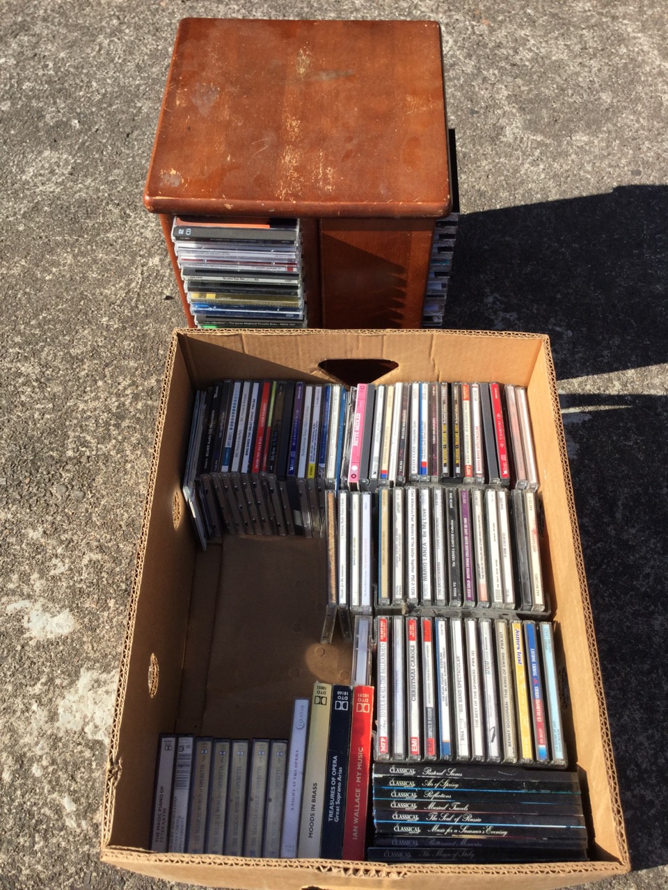 A revolving rack containing 64 CDs; and a box of approx 80 further CDs, casettes, etc. (A lot) - Image 2 of 3