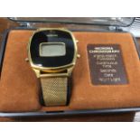 A 1976 boxed Microma chronograph, the gents wristwatch with stop-watch functions, night light, LCD