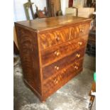 A Victorian satinwood chest with two short and three long cockbeaded graduated knobbed drawers,