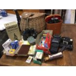 Miscellaneous collectors items including a cane fishing creel, two pairs of binoculars, LPs, a boxed