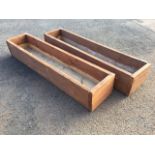 A pair of rectangular wood plant troughs, made up from 1.25in scaffolding boards. (52.5in) (2)