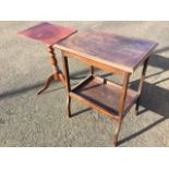 A mahogany occasional table with rectangular scalloped top on turned column raised on shaped