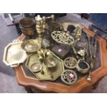 Miscellaneous brass including a Victorian brass candlestick, trays, stands, planters, toasting