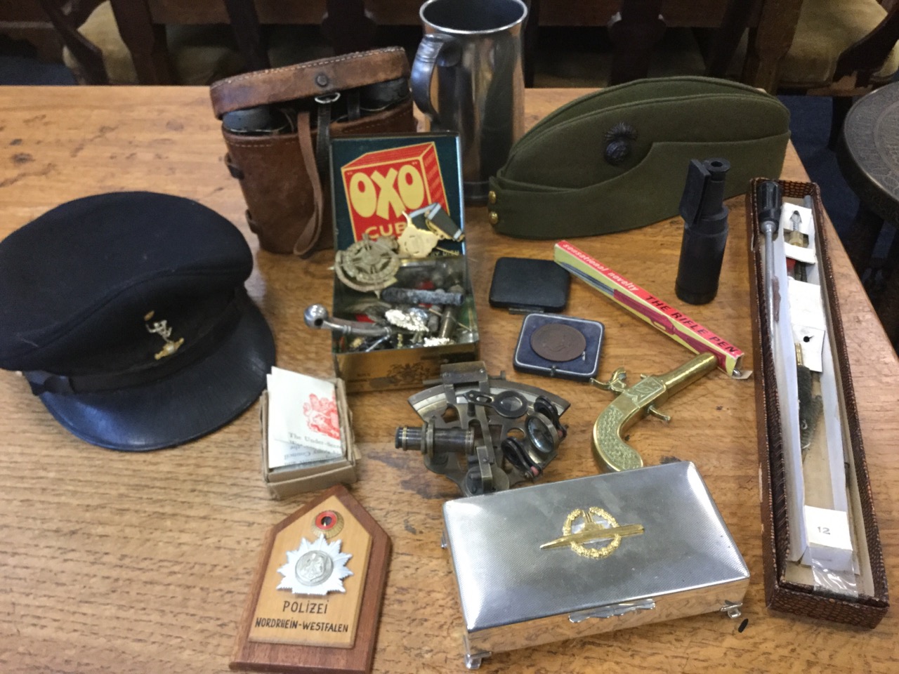 Miscellaneous items including an 1884 pewter rifle trophy, a boxed gun cleaning kit,