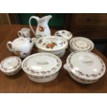 Several pieces of Royal Worcester decorated in the Evesham pattern - tureens & covers, teapot, jugs,
