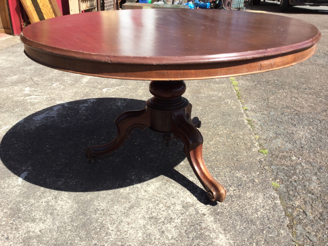 A circular Victorian mahogany breakfast table, the moulded top with plain frieze supported on a - Image 3 of 3