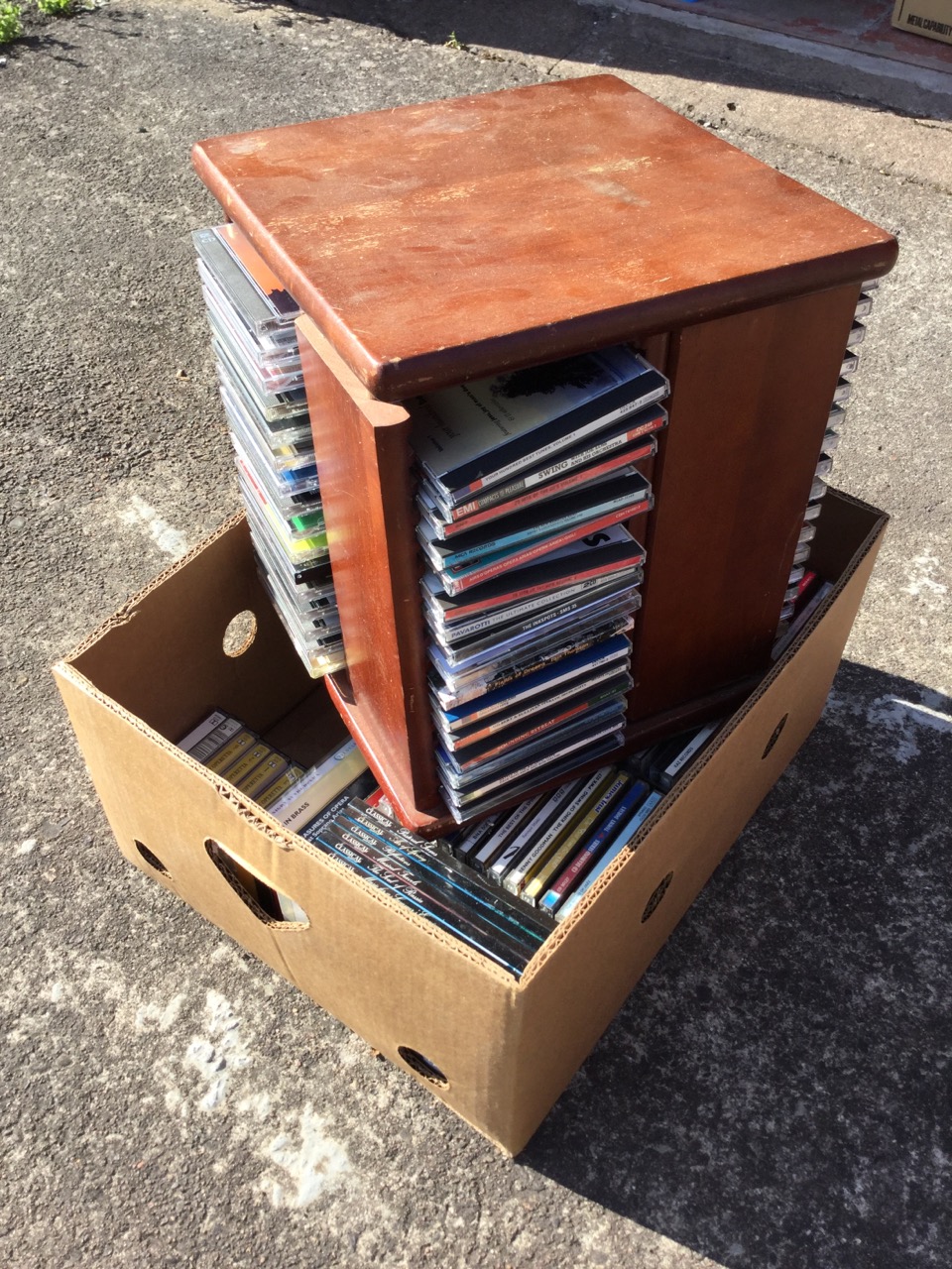 A revolving rack containing 64 CDs; and a box of approx 80 further CDs, casettes, etc. (A lot) - Image 3 of 3