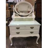 An Edwardian painted mahogany dressing table, with oval bevelled mirror on columns with urn